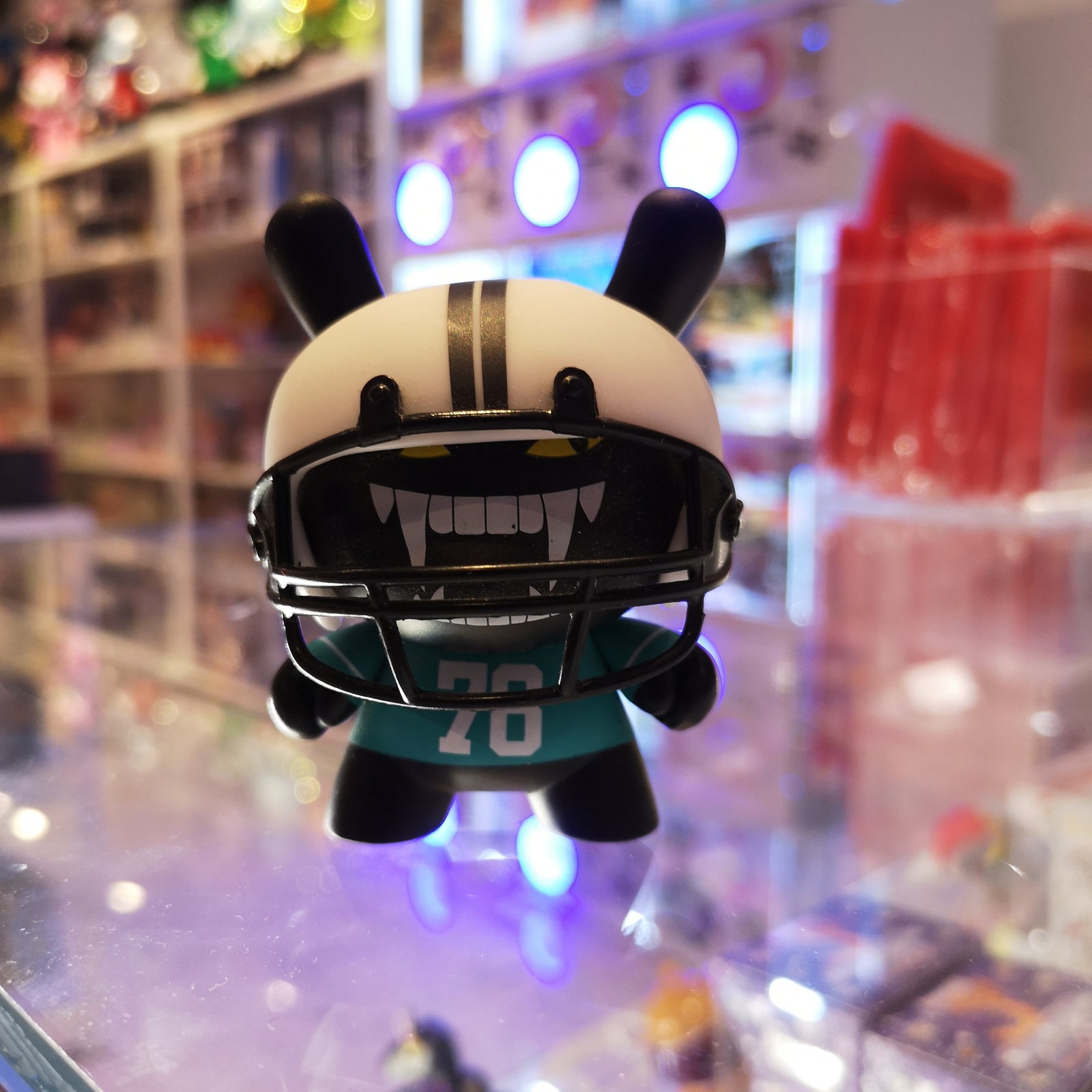 Mishka Football - Side Show Dunny Series by Kidrobot