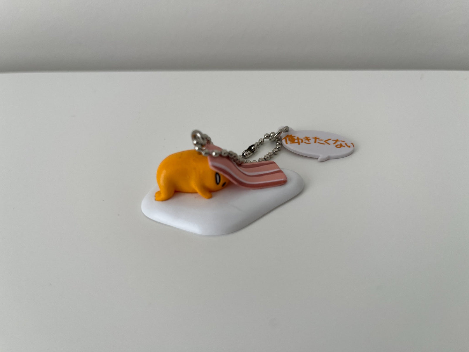 652eb54139e4ab4dc3c1b6b7_gudetama-with-bacon-keychain_1746671604390.jpg