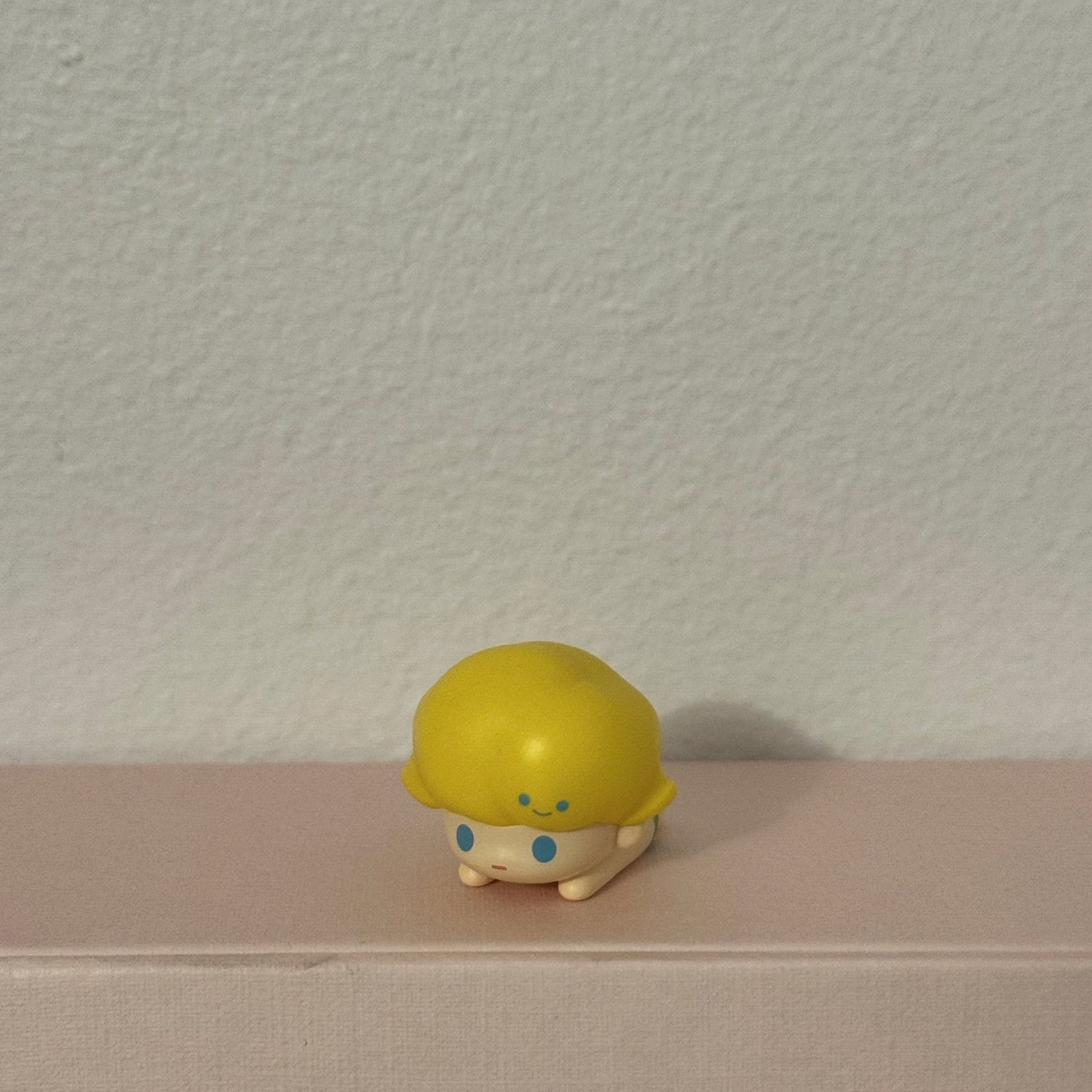 Dimoo Lying with Blue Eyes Yellow Hair POP MART Bean