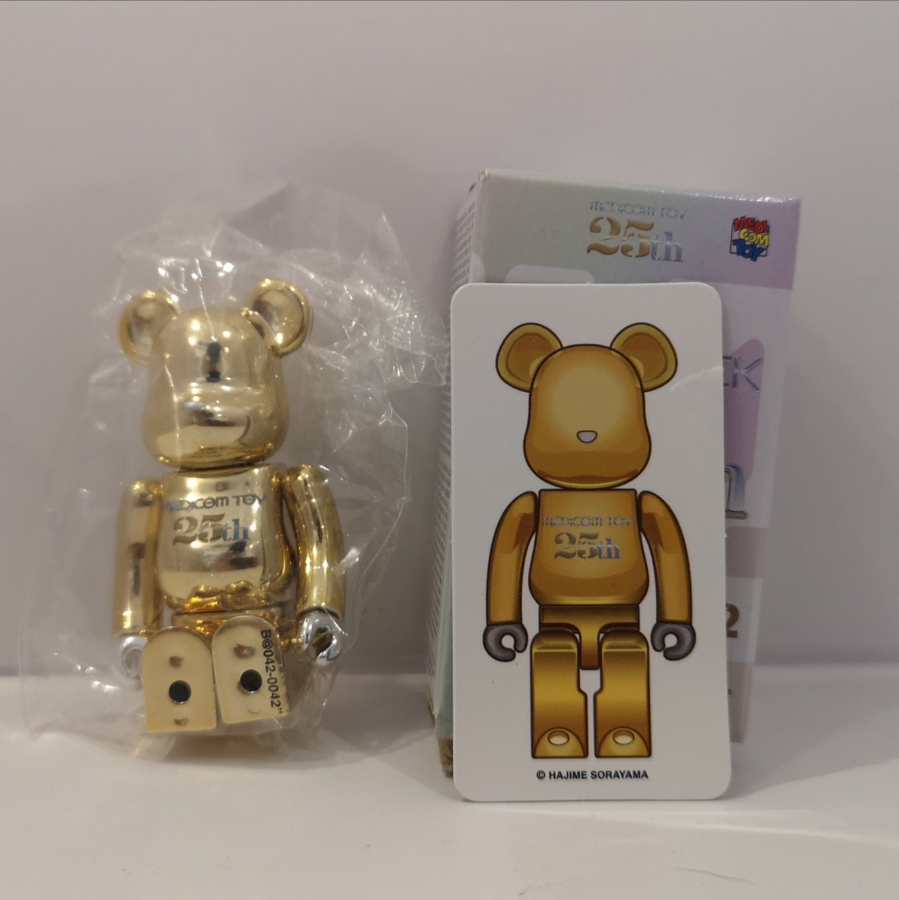 Sorayama Gold 25th Anniversary SECRET - Bearbrick Series 42 by Medicom